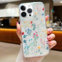 Třpytivý transparentní kryt pro iPhone 16 Pro - rozkvetlá louka