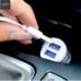 HOCO nabíječka do auta se dvěma USB porty + lightning konektor pro Apple iPhone / iPad / iPod - bílá